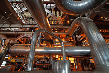 Image showing Equipment, cables and piping as found inside of a modern industr