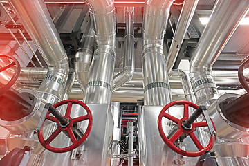 Image showing Equipment, cables and piping as found inside of a modern industr