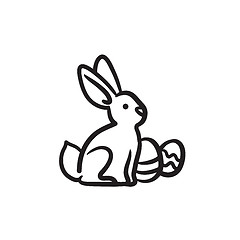 Image showing Easter bunny with eggs sketch icon.