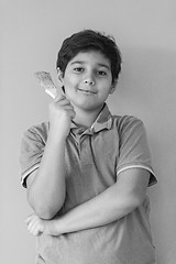 Image showing Portrait of a happy young boy painter