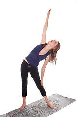 Image showing Woman stretching her body