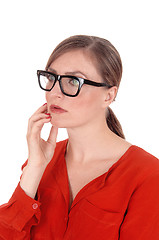 Image showing Troubled  young woman with glasses in portrait