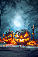 Image showing Halloween pumpkins on blue background