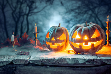 Image showing Halloween pumpkins on blue background