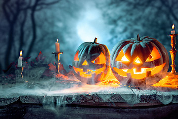 Image showing Halloween pumpkins on blue background