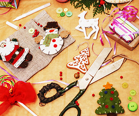 Image showing lot of stuff for handmade gifts, scissors, ribbon, paper with co