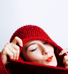 Image showing young pretty woman in sweater and scarf all over her face, lifes