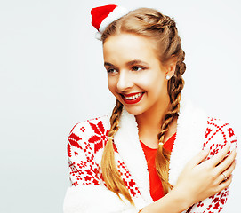 Image showing young pretty happy smiling blond woman on christmas in santas re