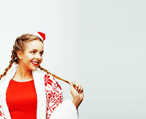 Image showing young pretty happy smiling blond woman on christmas in santas re