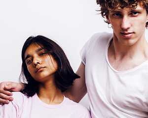 Image showing best friends teenage girl and boy together having fun, posing emotional on white background, couple happy smiling, lifestyle people concept, blond and brunette multi nations