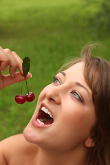 Image showing Girl with cherry