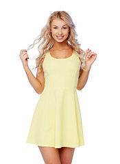 Image showing happy smiling beautiful young woman in dress