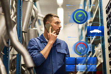 Image showing auto mechanic with clipboard at car workshop