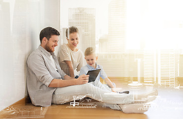 Image showing happy family with tablet pc moving to new home