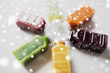 Image showing bottles with different fruit or vegetable juices