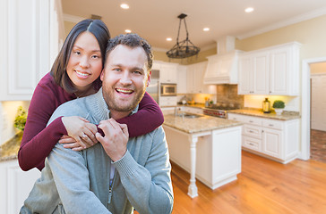 Image showing Mixed Race Caucasian and Chinese Couple Inside Beautiful Custom 