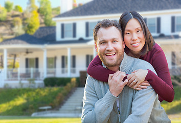 Image showing Mixed Race Caucasian and Chinese Couple In Front Yard of Beautif