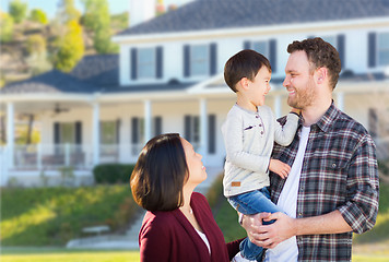 Image showing Young Mixed Race Caucasian and Chinese Family In Front of Custom