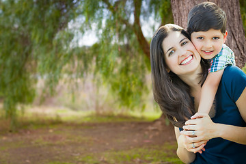 Image showing Young Mother and Son Portrait Outdoors.
