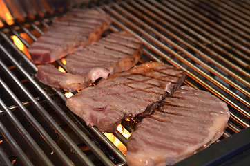 Image showing Beef steaks on the grill