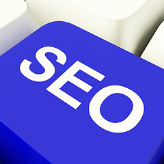 Image showing SEO Computer Key In Blue Showing Internet Marketing And Optimiza