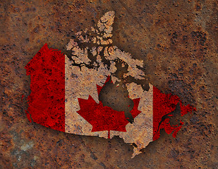 Image showing Map and flag of Canada on rusty metal