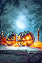 Image showing Halloween pumpkins on blue background