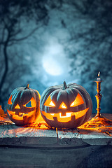 Image showing Halloween pumpkins on blue background