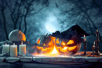 Image showing Halloween pumpkins on blue background