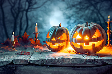 Image showing Halloween pumpkins on blue background