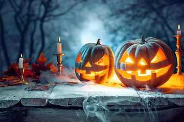 Image showing Halloween pumpkins on blue background