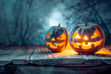 Image showing Halloween pumpkins on blue background