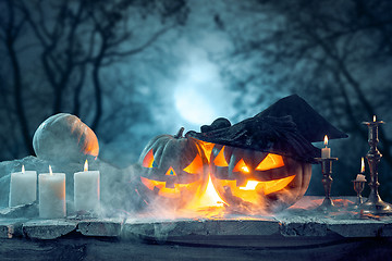 Image showing Halloween pumpkins on blue background