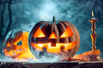 Image showing Halloween pumpkins on blue background