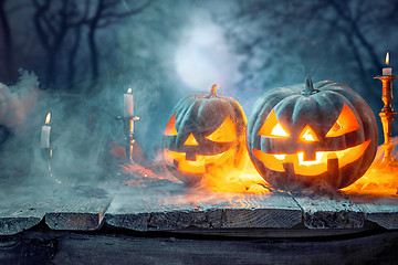 Image showing Halloween pumpkins on blue background