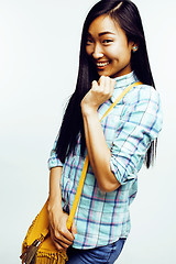 Image showing young pretty asian woman posing cheerful emotional isolated on white background, lifestyle people concept