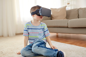 Image showing little boy in vr headset or 3d glasses at home