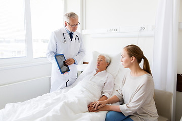 Image showing senior woman and doctor with tablet pc at hospital