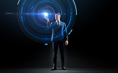 Image showing businessman in suit with virtual projection