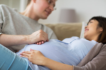 Image showing close up of man and pregnant woman