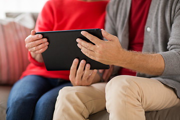 Image showing close up of senior couple with tablet pc at home