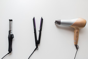 Image showing hairdryer, hot styler and curling iron or tongs