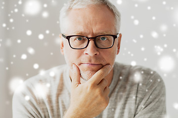 Image showing close up of senior man in glasses thinking