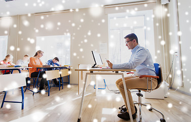 Image showing students and teacher with tablet pc at school