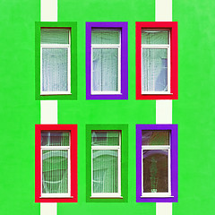 Image showing Green Wall With Colorful Windows