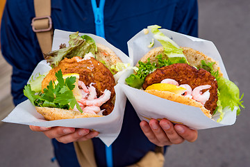 Image showing Fast street food seafood. Norway Lofoten Islands, fish cutlet wi