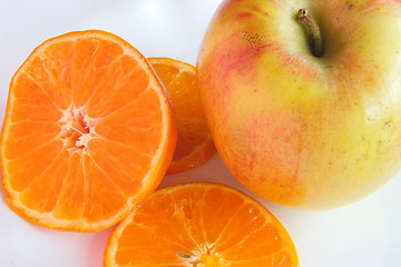 Image showing apple and slices of orange