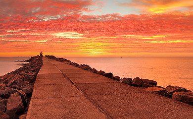 Image showing Sensational red sunrise skies at the Breakwall