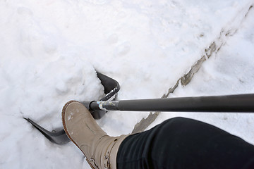 Image showing Woman Shoveling snow 