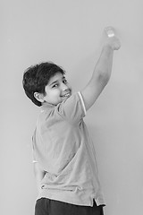 Image showing Portrait of a happy young boy painter